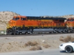 BNSF 7912 leads a vehicle train westbound.